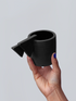 Black matte stoneware ceramic mug with a double layered triangle handle.