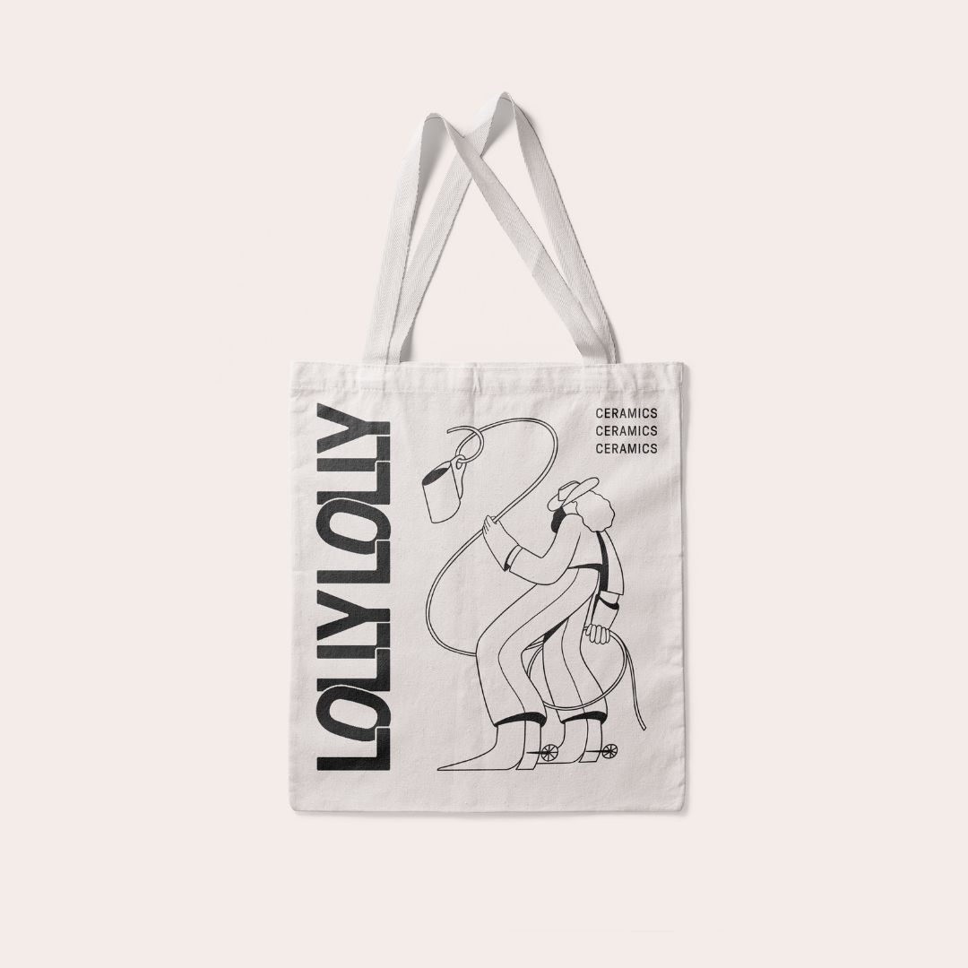 Cowgirl Lolly Tote Bag with the word "ceramics" printed three times in the top right corner of the bag.