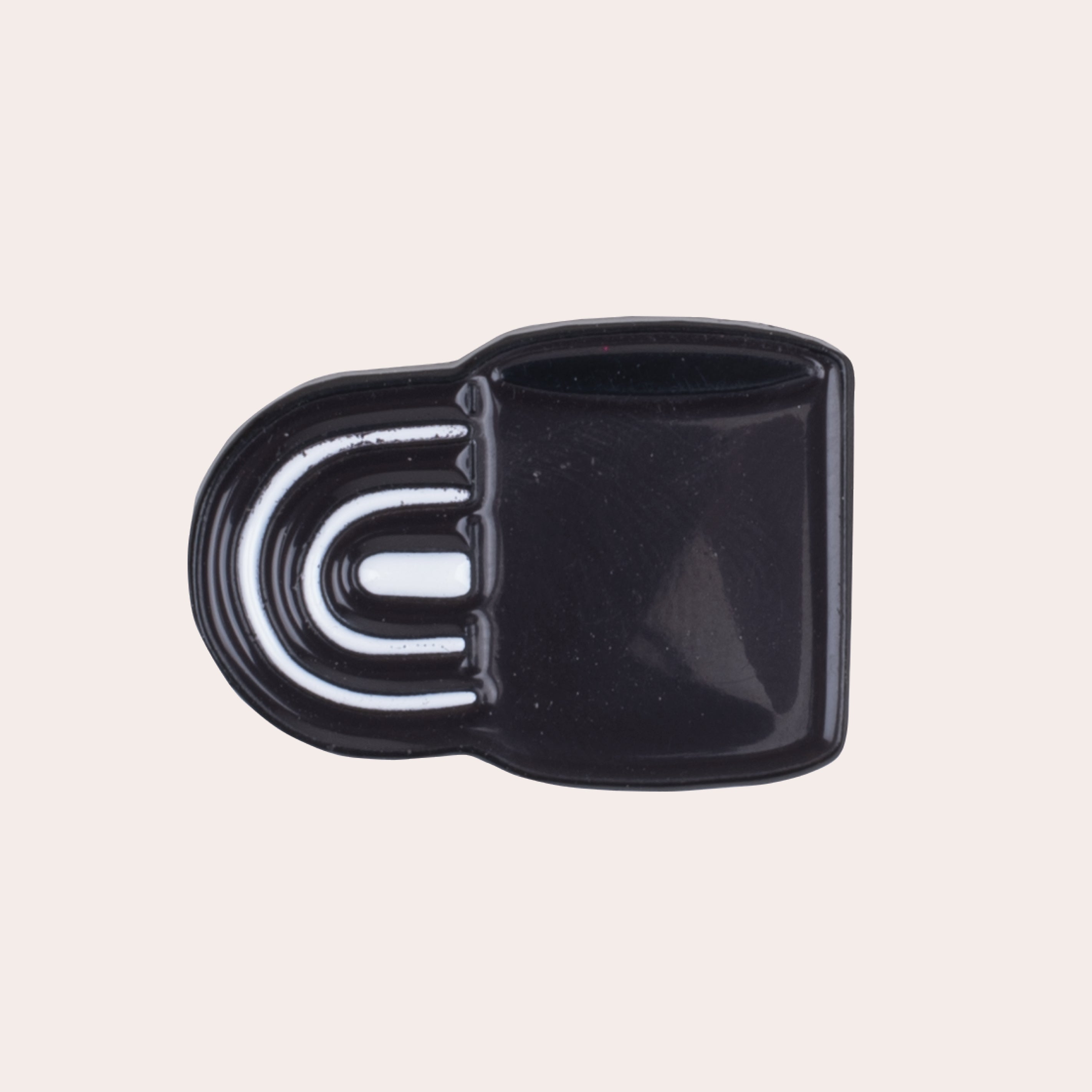 A soft enamel rainbow mug pin with PVC rubber back.