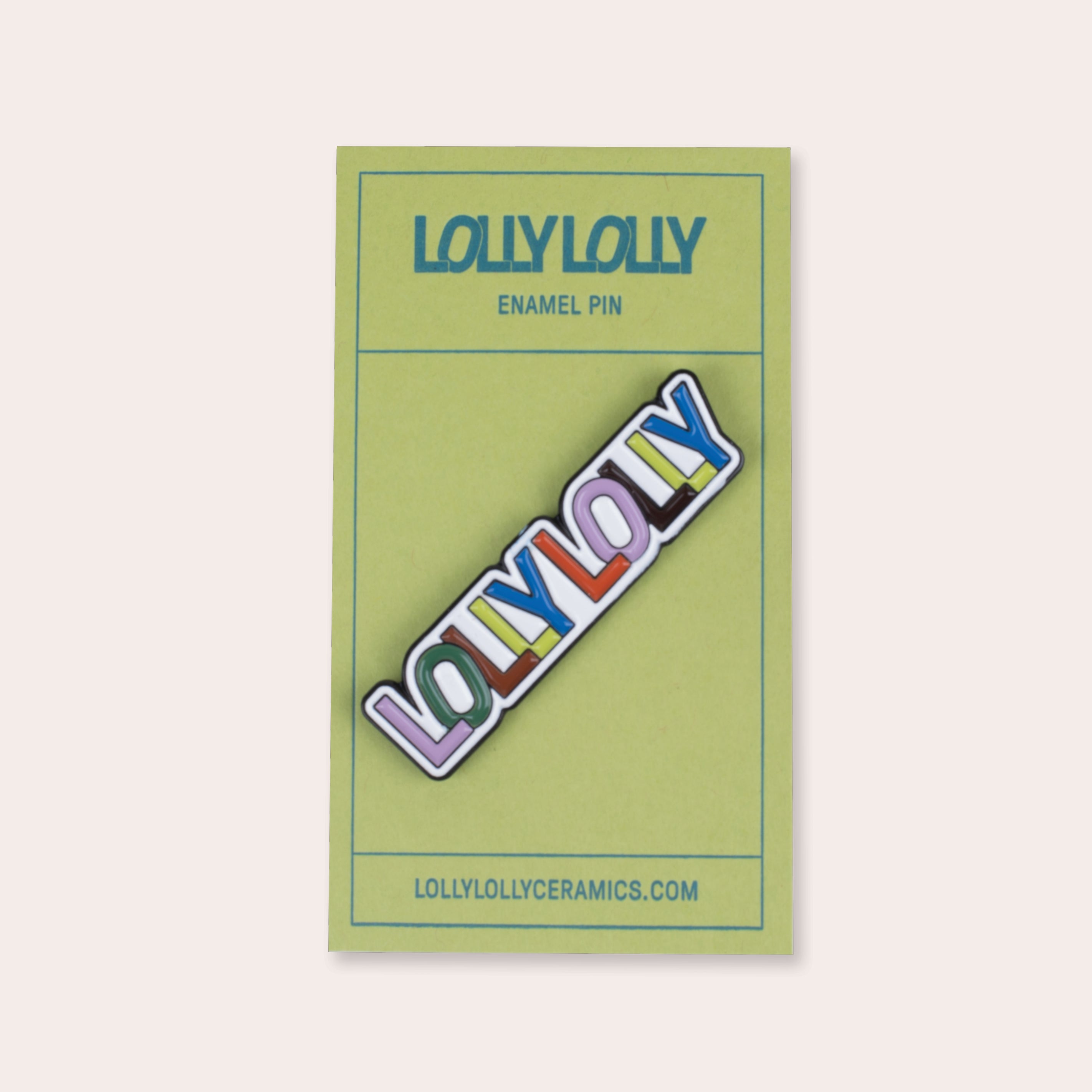 A soft enamel pin that reads "Lolly Lolly" in colorful letters with PVC rubber back.