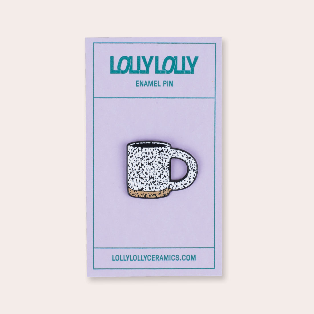 A soft enamel speckled mug pin with PVC rubber back. 